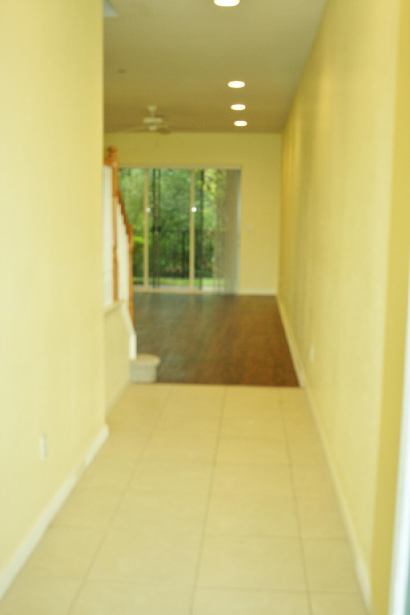 334 Southwest Walking Path, Unit 334 Stuart, FL 34997 - Photo 3 of 34 a view of an empty room with a window