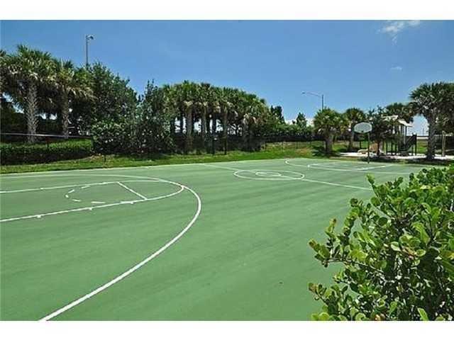 334 Southwest Walking Path, Unit 334 Stuart, FL 34997 - Photo 32 of 34 a view of a tennis court