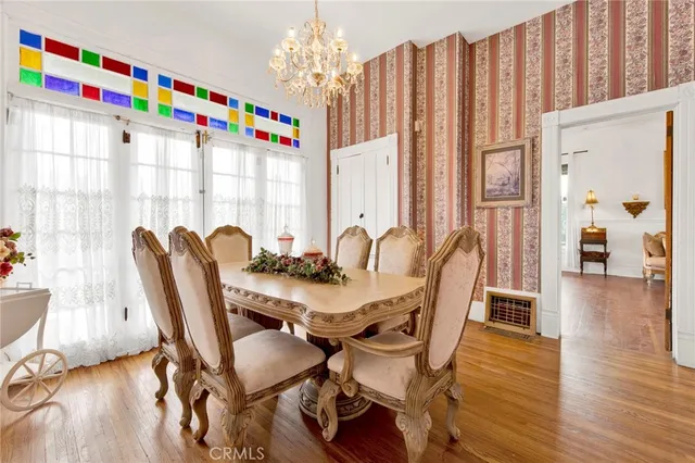 a kitchen with stainless steel appliances a refrigerator and a stove top oven