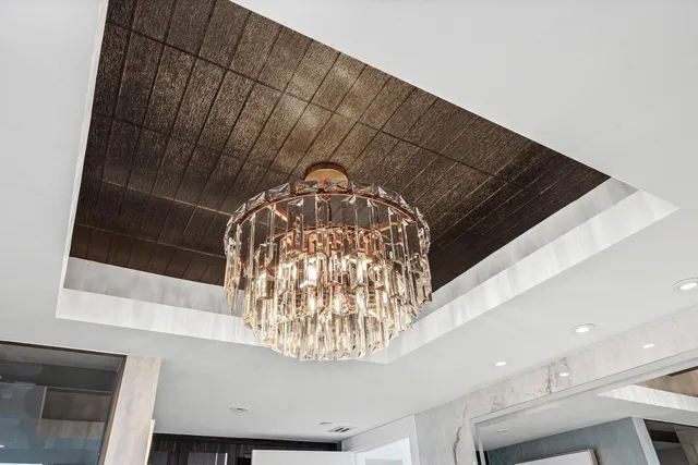 a bathroom with a shower and a glass door