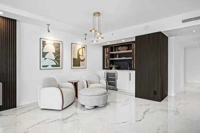 a spacious bathroom with a toilet sink and shower