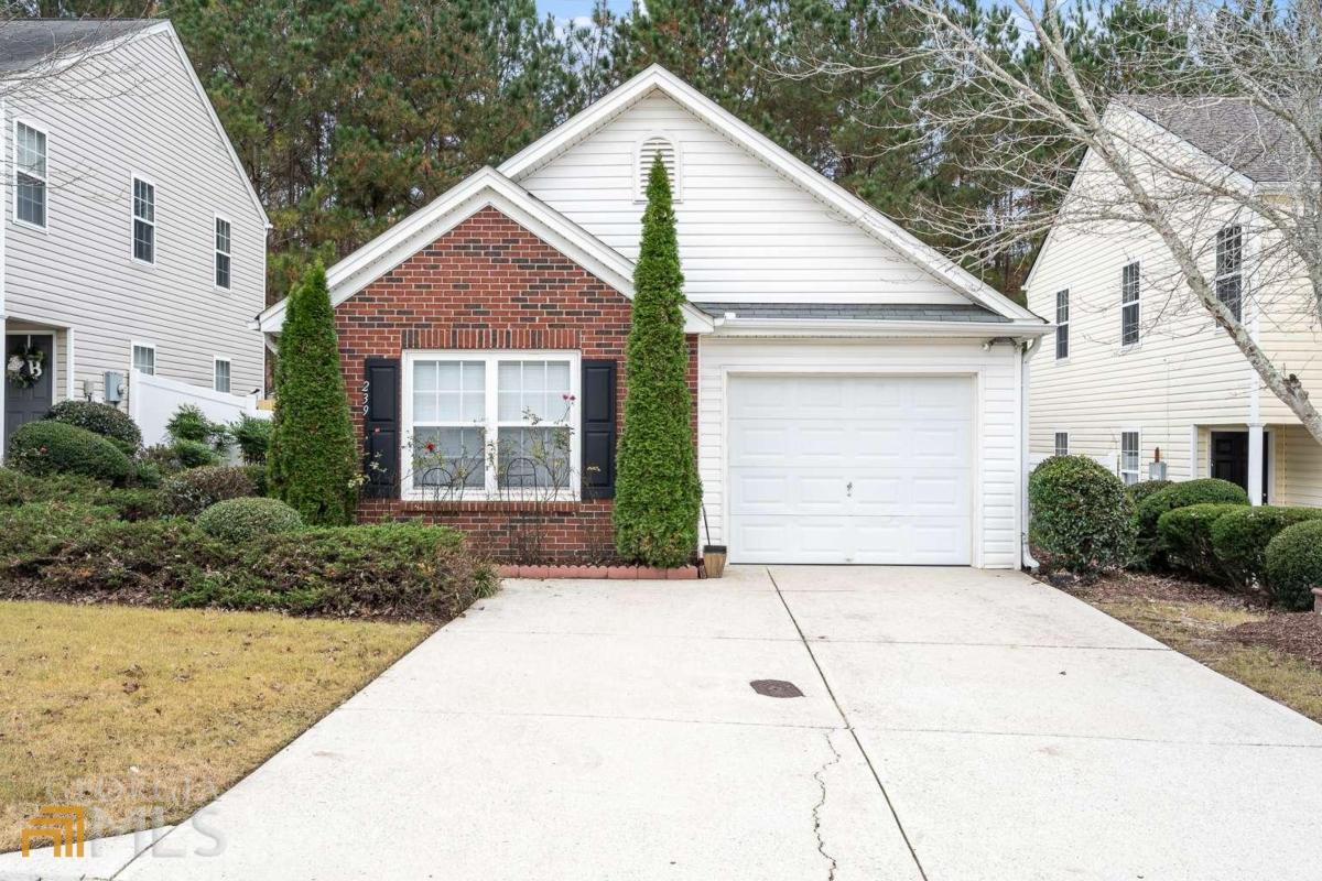 239 Silver Ridge Drive, Unit PROVIDENCE Dallas, GA 30157 - Photo 1 of 1 a view of a house with a yard
