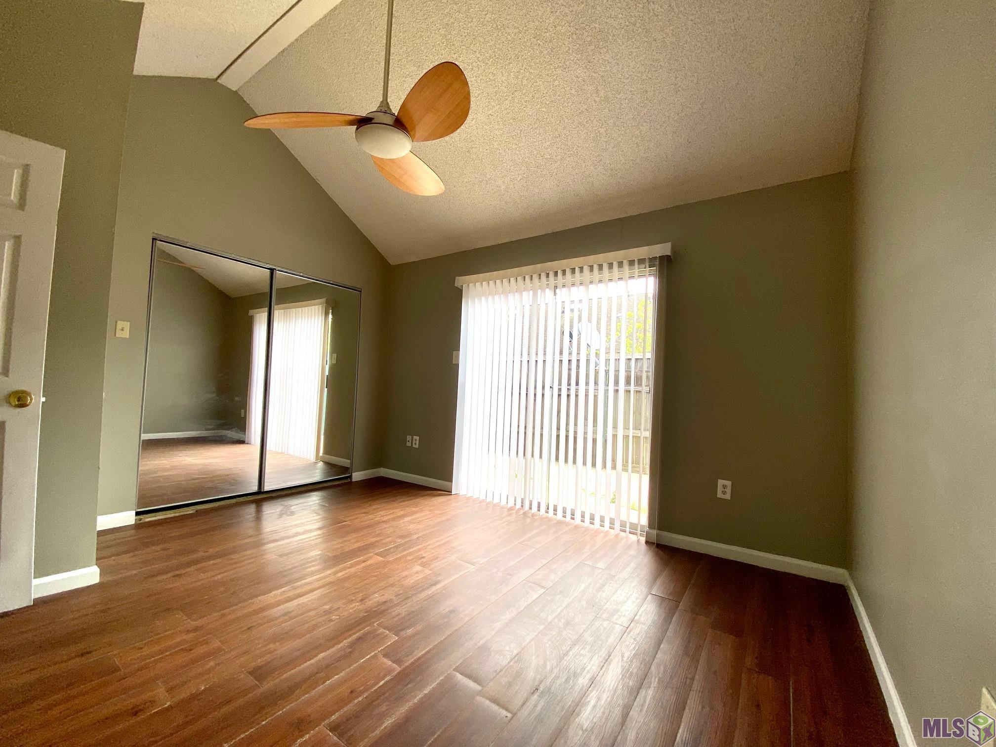 9149 Ridge Pine Drive, Unit 9149 Baton Rouge, LA 70810 - Photo 5 of 17 Bedroom with Patio