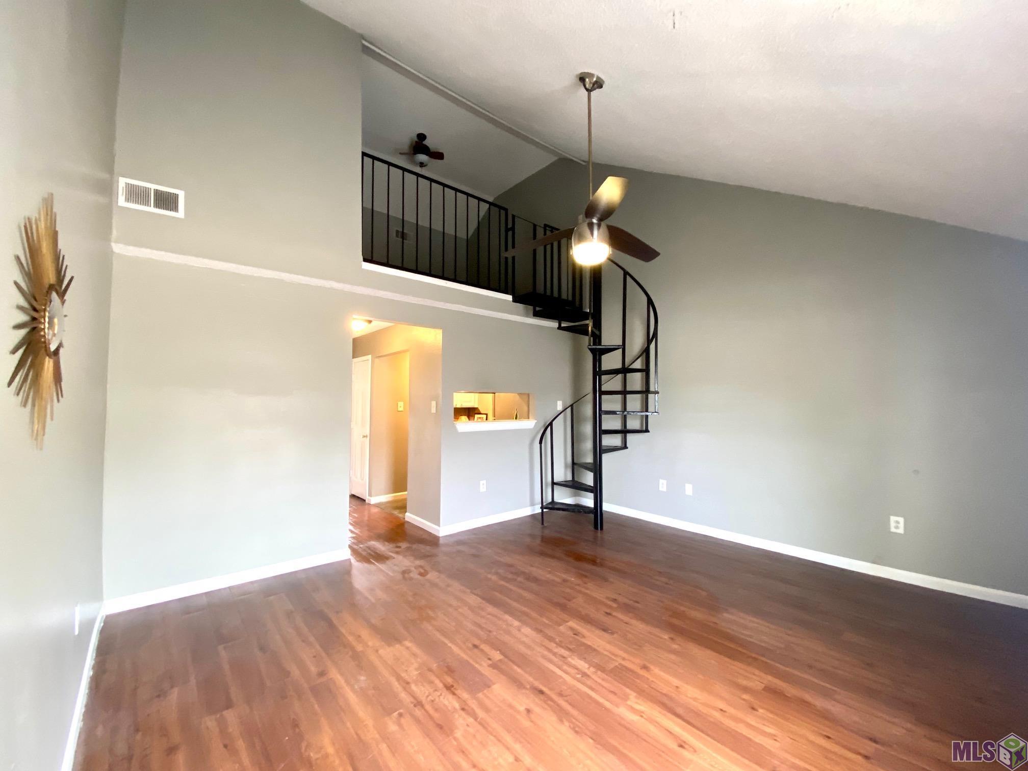 9149 Ridge Pine Drive, Unit 9149 Baton Rouge, LA 70810 - Photo 8 of 17 Wrought Iron Spiral Staircase