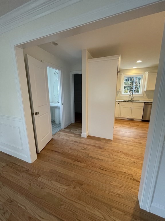 12 Hayfield Road, Unit 1 Dracut, MA 01826 - Photo 12 of 32 a view of a living room and hardwood floor