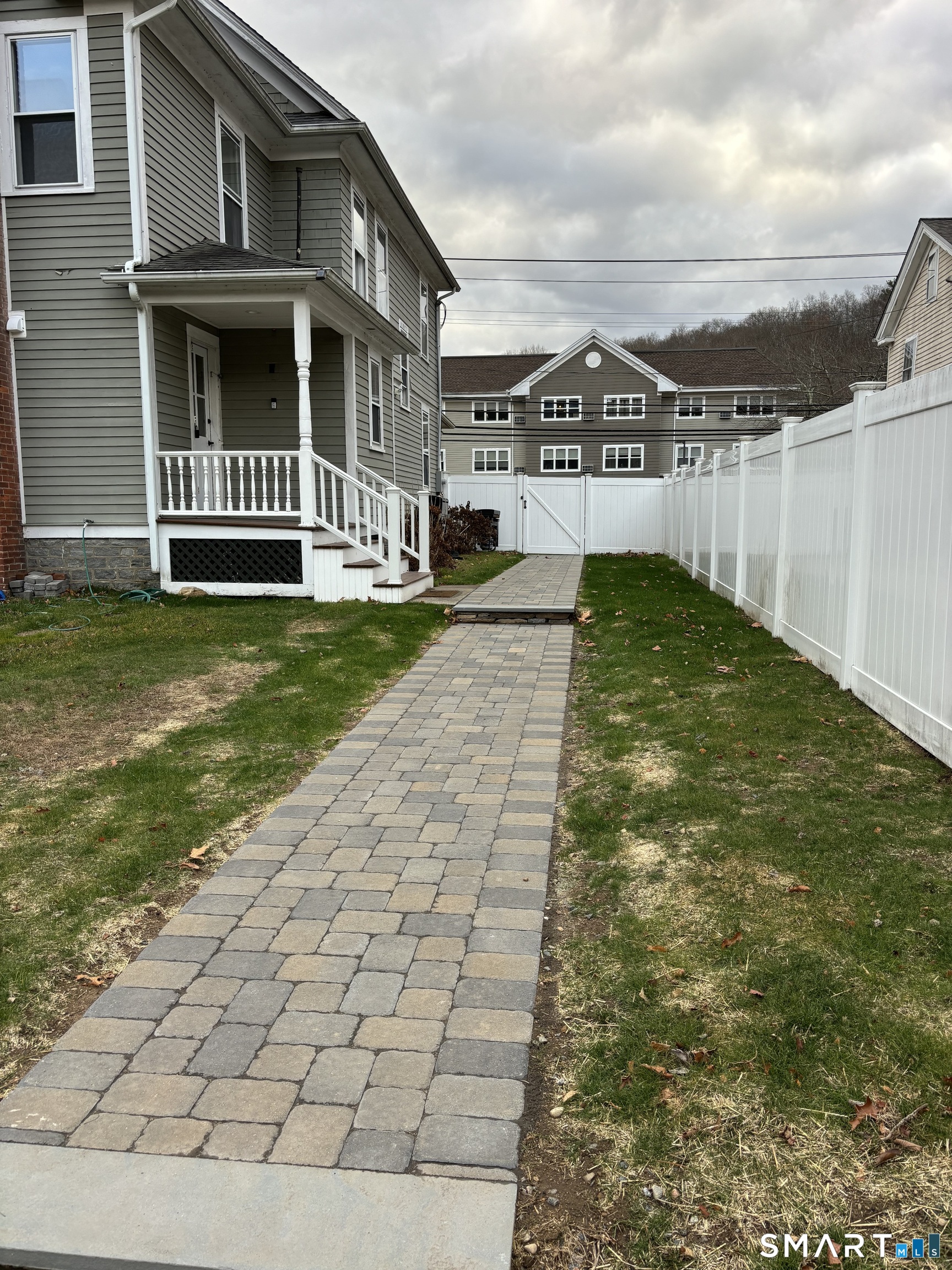 61 Main Street, Unit B Deep River, CT 06417 - Photo 12 of 13 a view of a house with a yard