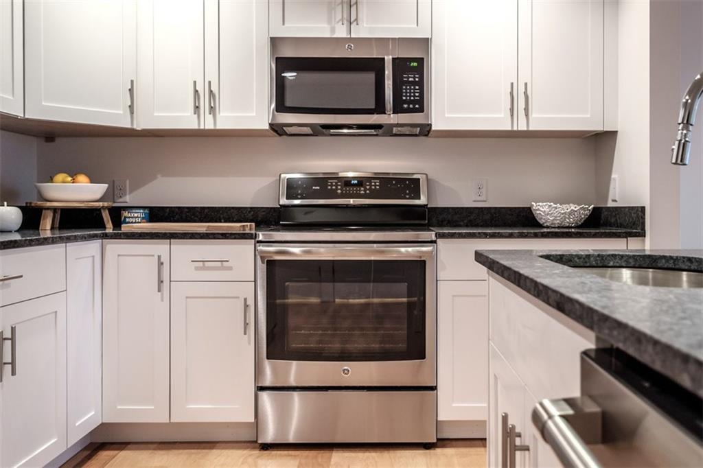 Granite and stainless steel kitchen...