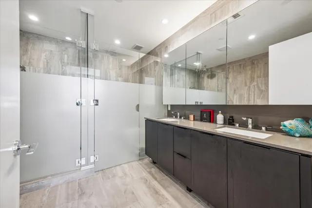 a kitchen with a sink and cabinets