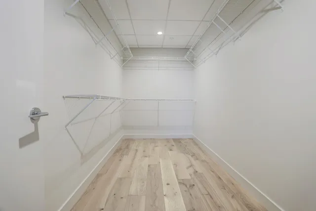 a view of a room with racks on the wall