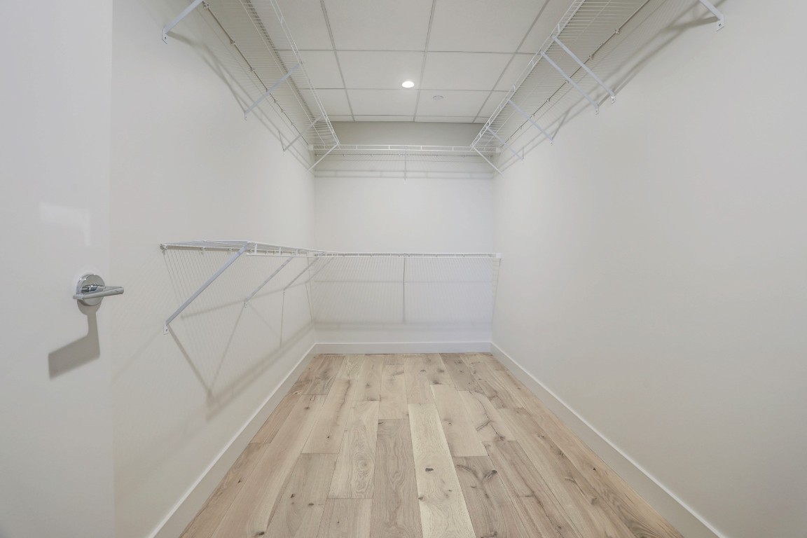 44 East Avenue, Unit 4203 Austin, TX 78701 - Photo 19 of 26 a view of a room with racks on the wall