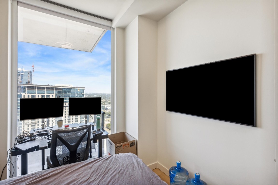 44 East Avenue, Unit 4203 Austin, TX 78701 - Photo 20 of 26 a view of a living room with a flat screen tv