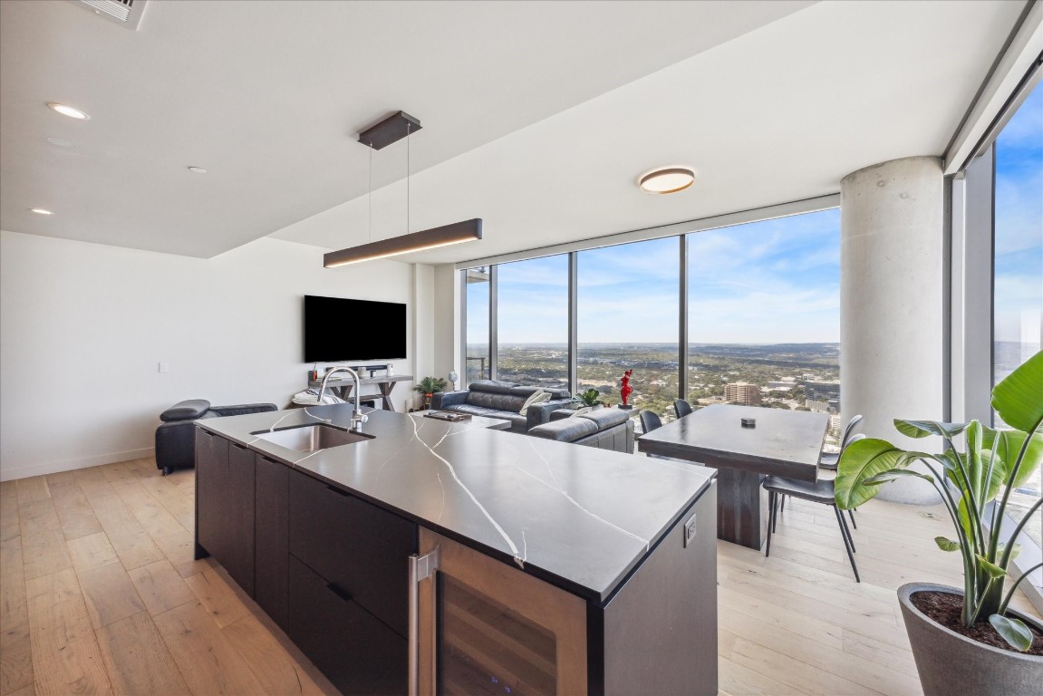 44 East Avenue, Unit 4203 Austin, TX 78701 - Photo 7 of 26 a kitchen with sink attached with living room