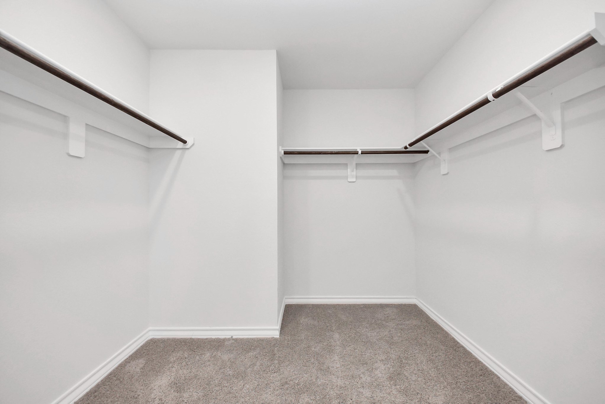 25740 John Wayne Drive Splendora, TX 77372 - Photo 34 of 48 a view of an empty walk in closet