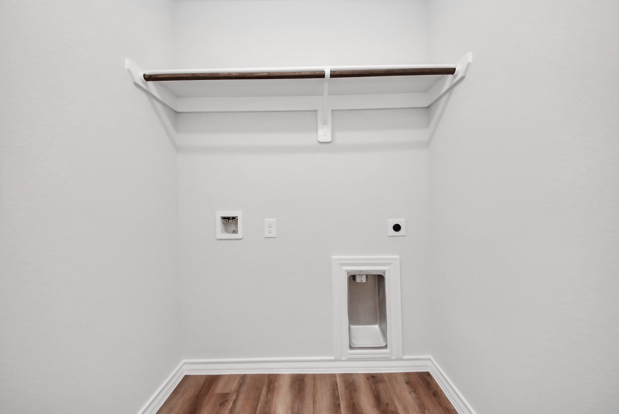 25740 John Wayne Drive Splendora, TX 77372 - Photo 36 of 48 a view of a small space with racks on the wall