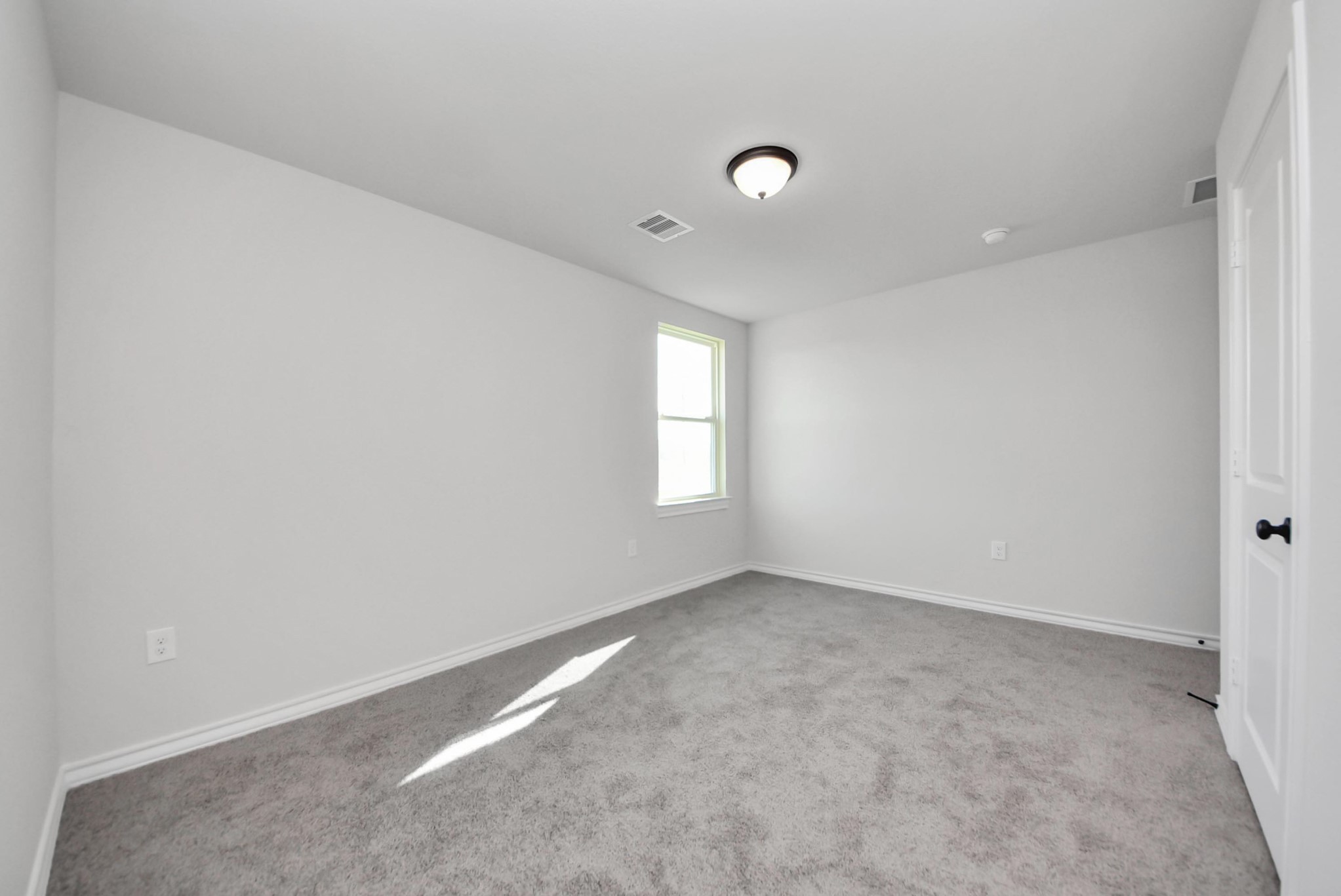 25740 John Wayne Drive Splendora, TX 77372 - Photo 41 of 48 a view of an empty room with a window