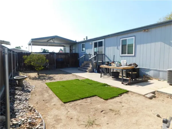 a view of backyard of the house
