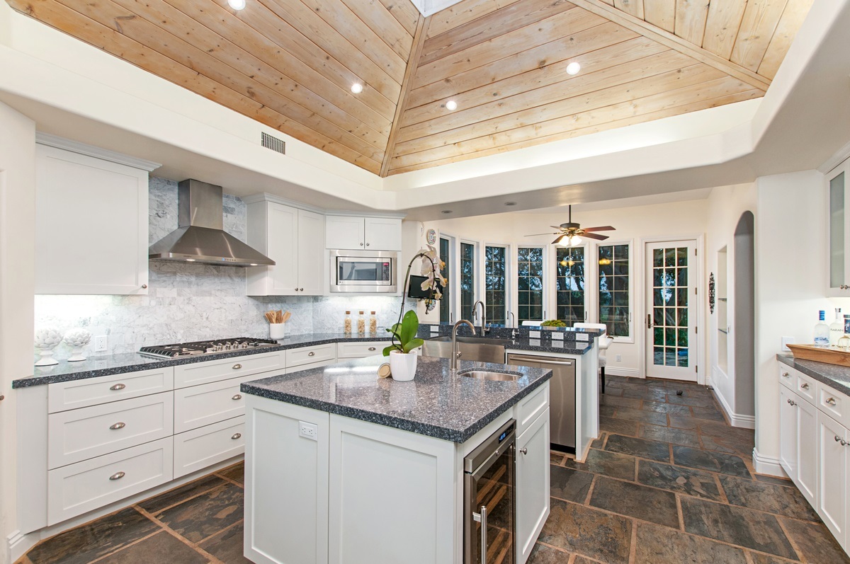 14955 Rancho Santa Fe Farms Road Rancho Santa Fe, CA 92067 - Photo 13 of 25 Refreshed and updated eat-in kitchen enjoys loads of morning light