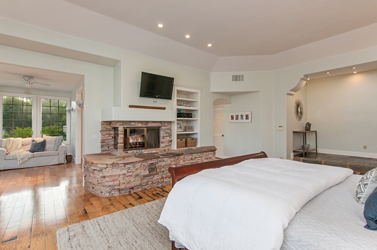 14955 Rancho Santa Fe Farms Road Rancho Santa Fe, CA 92067 - Photo 15 of 25 Spacious retreat with a lovely sitting area and french doors to the spa, pool and patios.