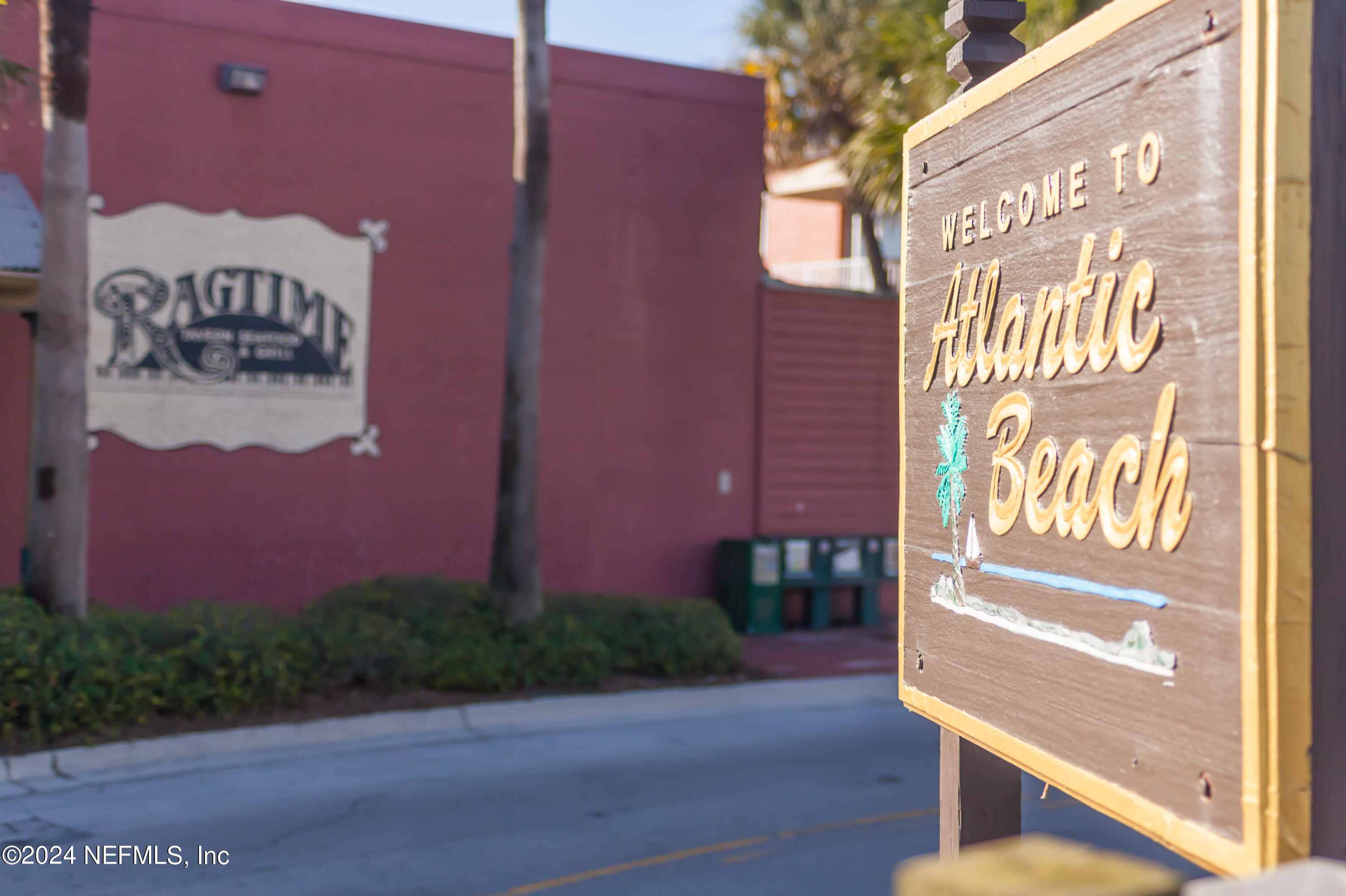 10 10th Street, Unit 17 Atlantic Beach, FL 32233 - Photo 46 of 60 a sign that is on the side of a building