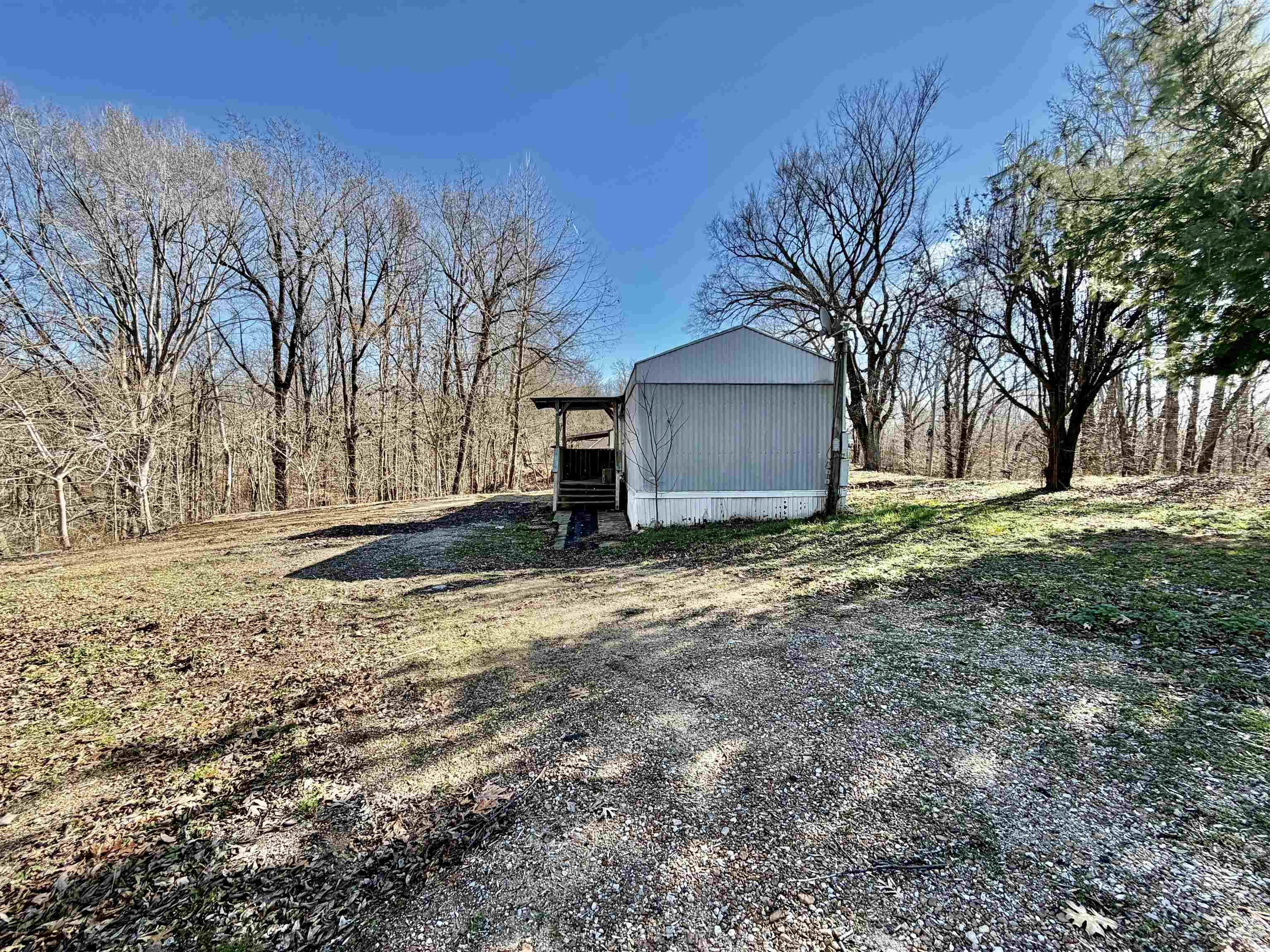 284 Double Bridges Road Munford, TN 38058 - Photo 2 of 5 a view of a yard with a house