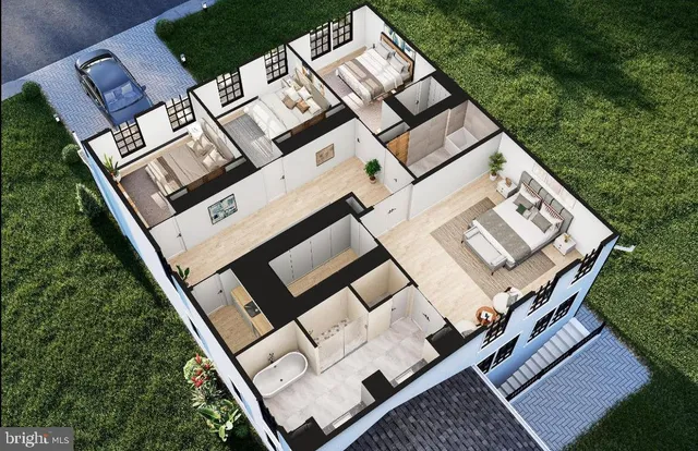 an aerial view of a house with a yard