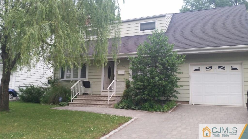 1087 Sayre Road South Union, NJ 07083 - Photo 2 of 20 a view of a house with a yard and plants