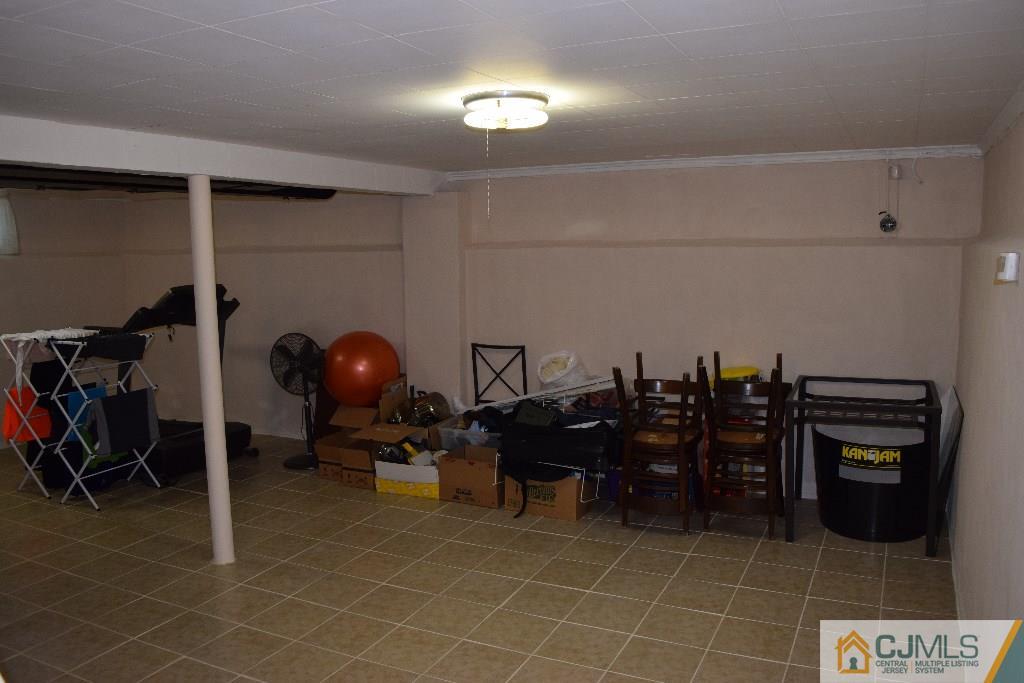 1087 Sayre Road South Union, NJ 07083 - Photo 13 of 20 a very nice looking room with many windows
