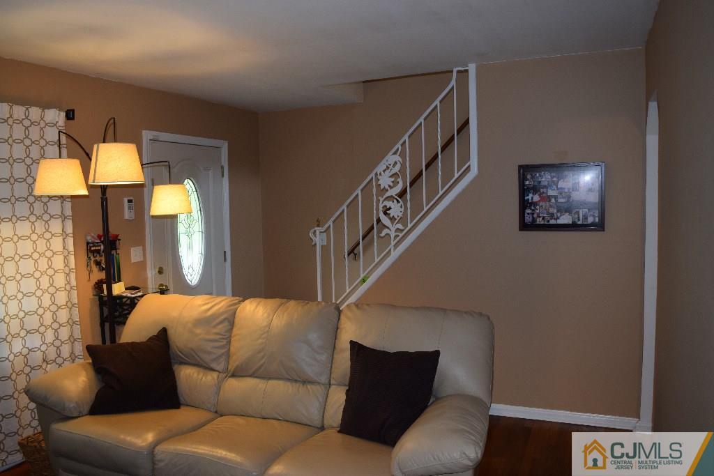1087 Sayre Road South Union, NJ 07083 - Photo 3 of 20 a living room with furniture and a flat screen tv