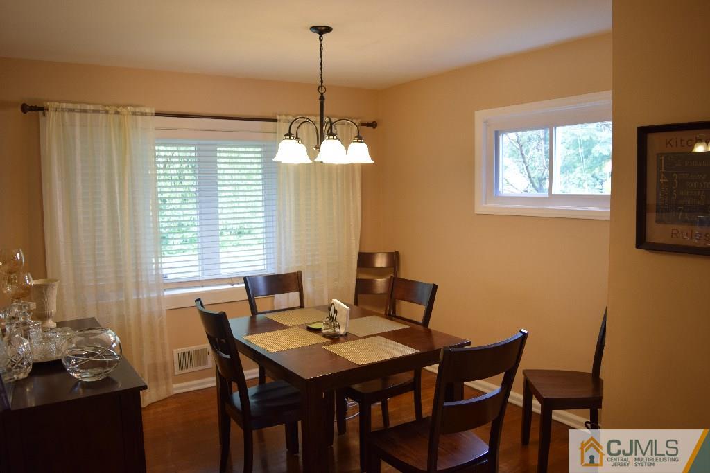 1087 Sayre Road South Union, NJ 07083 - Photo 8 of 20 a view of a dining room with furniture window and outside view