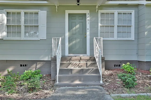 a view of a entrance door of the house