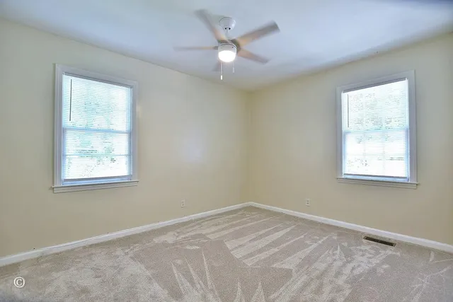 a view of a room with a window