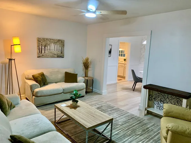 a living room with furniture and a couch