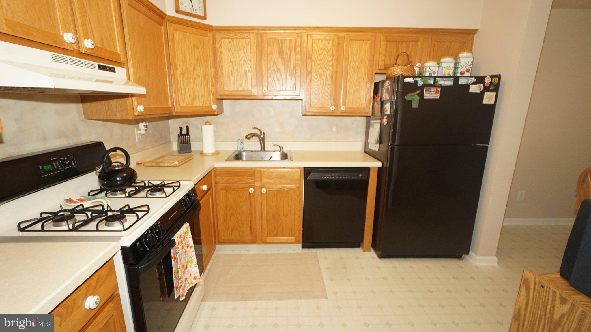 1662 Gibson Road Bensalem, PA 19020 - Photo 11 of 24 Cozy kitchen with warm wood accents.