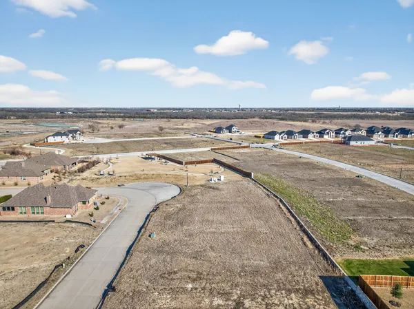a view of a swimming pool with an outdoor space and seating area