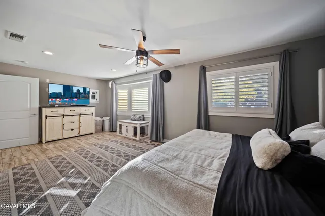 a view of a patio with a table chairs and a patio