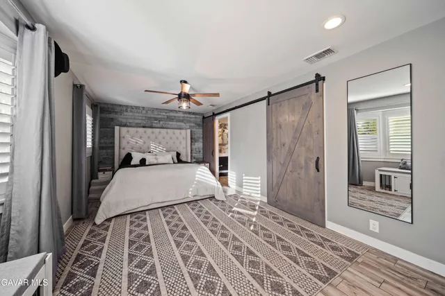 a view of swimming pool with lounge chair