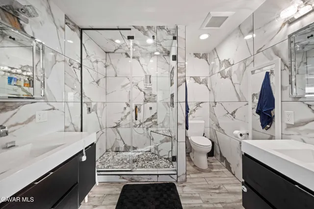 a view of pool with a garden