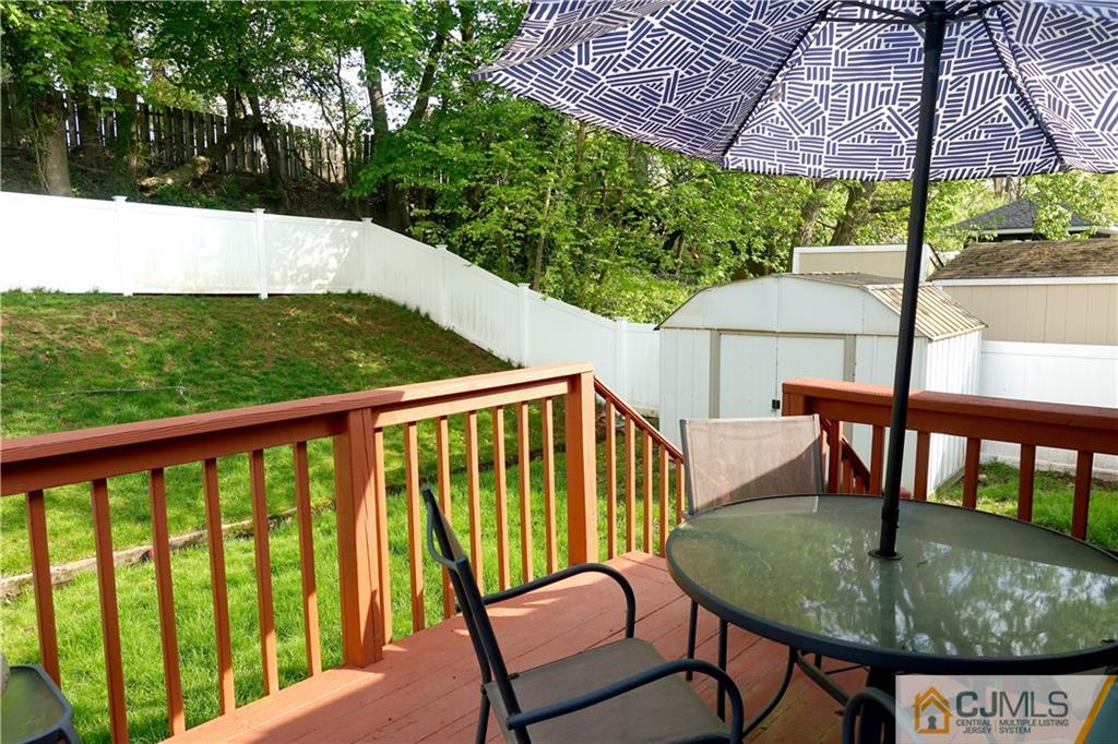 194 McFarlane Road Colonia, NJ 07067 - Photo 11 of 16 a view of a chairs and table in the balcony