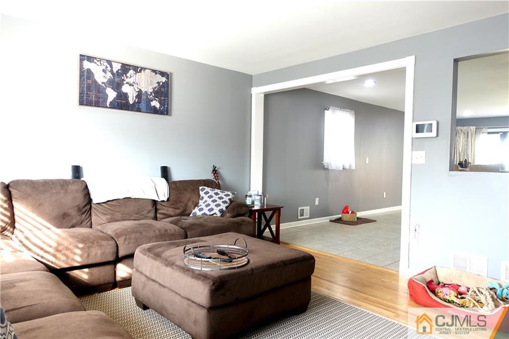 194 McFarlane Road Colonia, NJ 07067 - Photo 3 of 16 a living room with furniture and a wooden floor