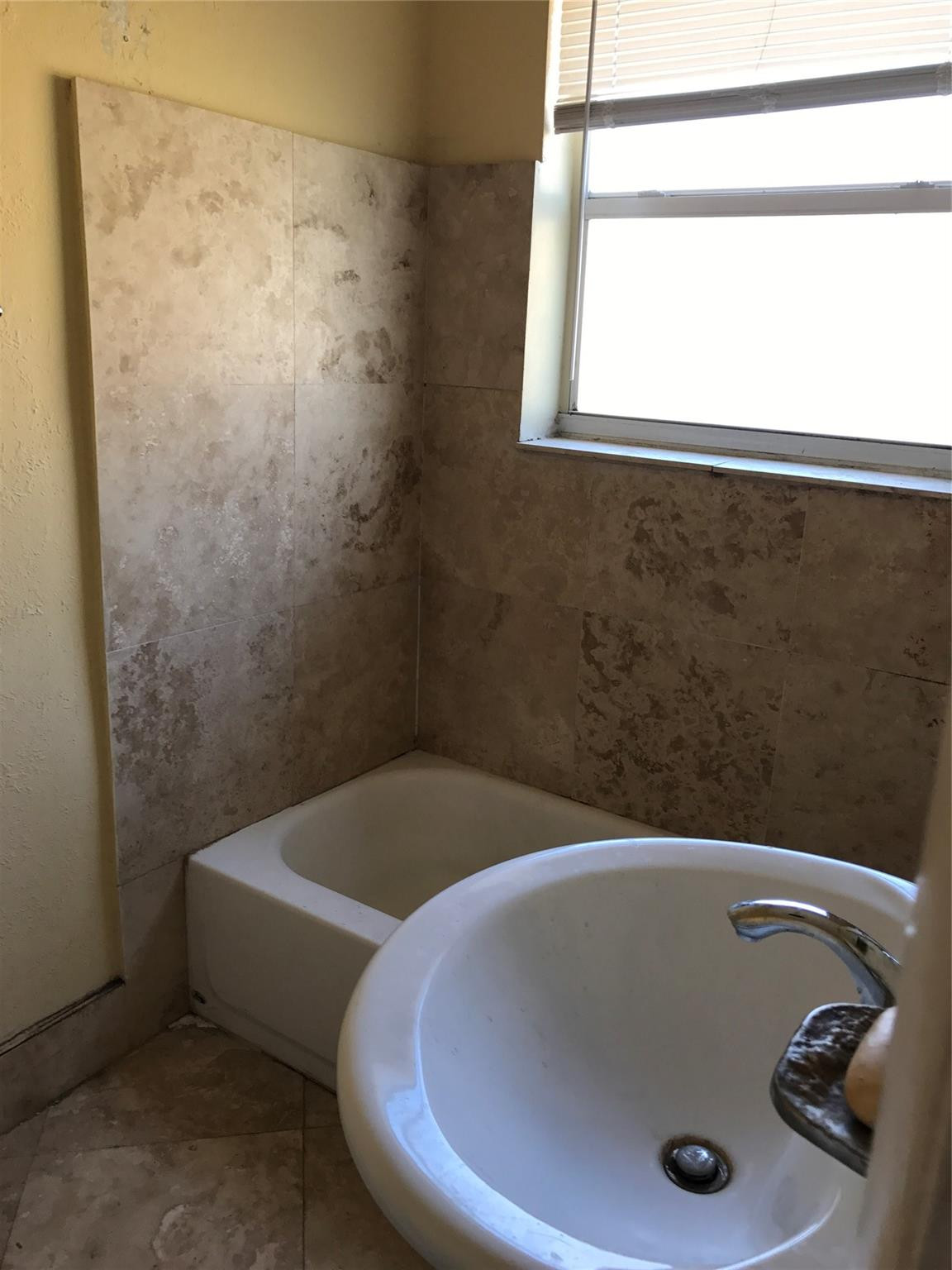 Undisclosed Address Pompano Beach, FL 33064 - Photo 1 of 5 a view of a bathtub in a bathroom
