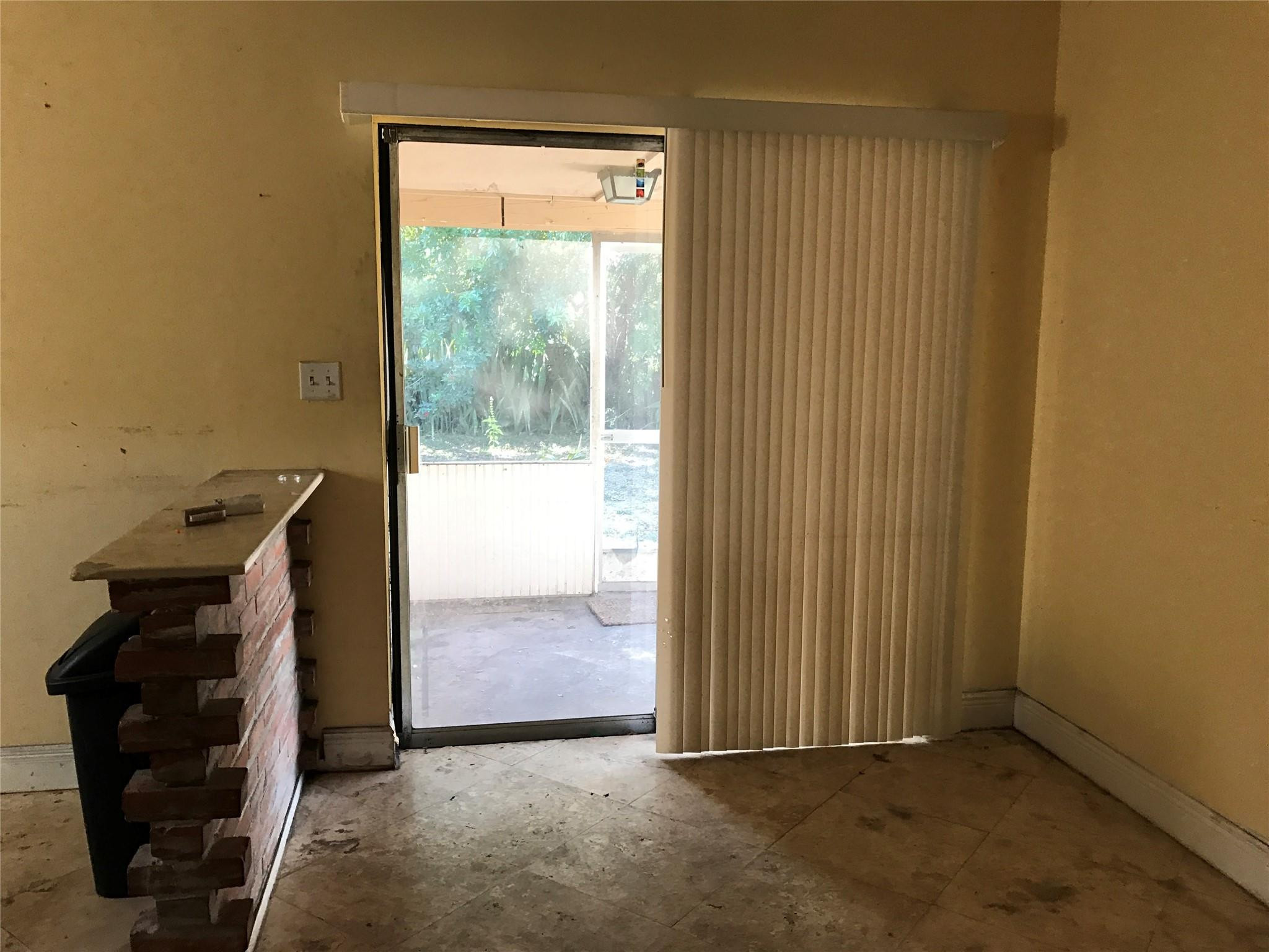 Undisclosed Address Pompano Beach, FL 33064 - Photo 2 of 5 an empty room with windows