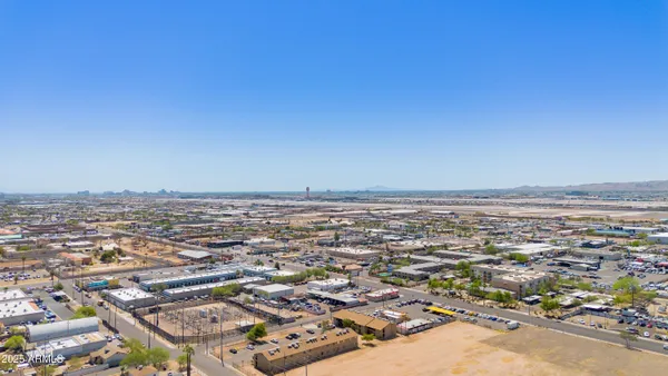 an aerial view of residential building and parking space