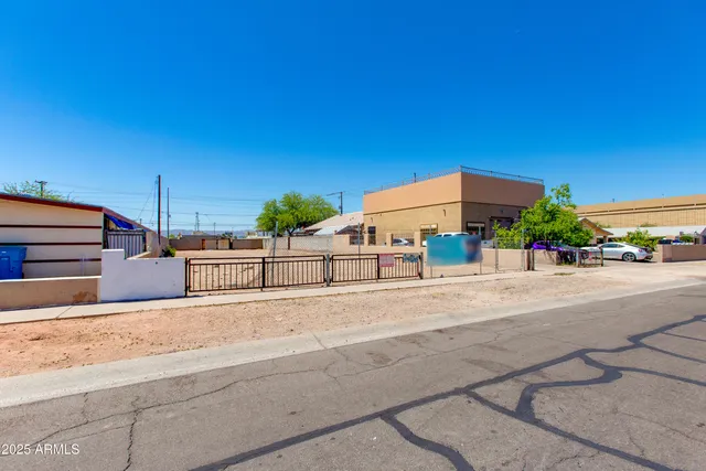 a street view with tall buildings and a street view