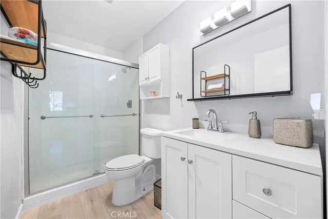 a bedroom with a workspace