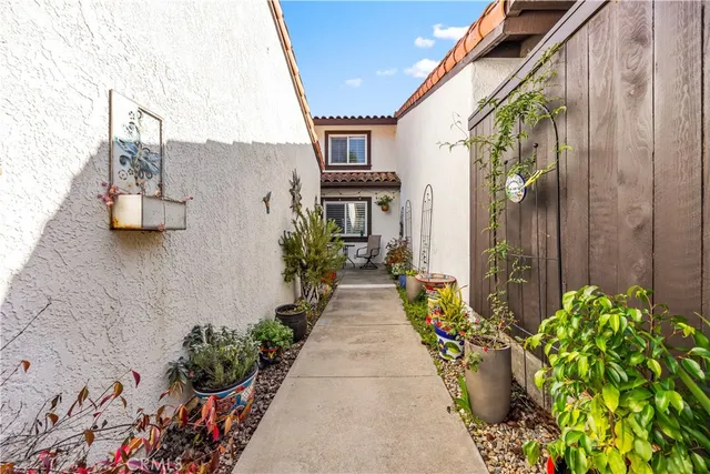 a entryway with flower pots