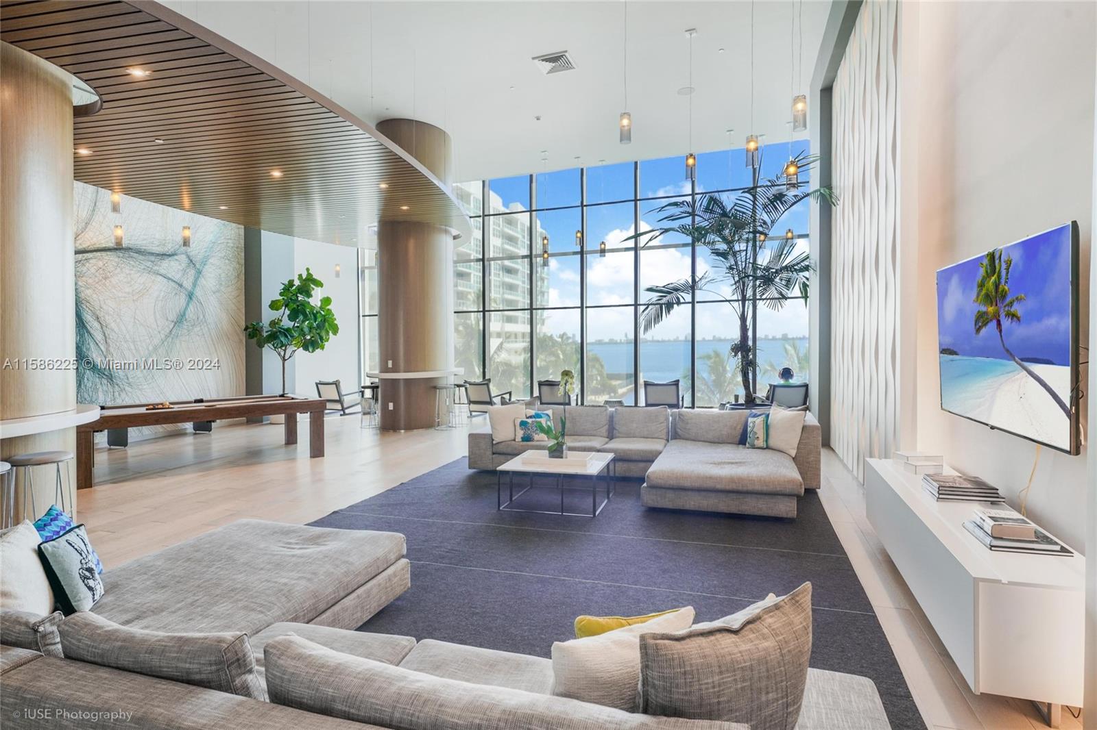 460 Northeast 28th Street, Unit 806 Miami, FL 33137 - Photo 3 of 19 a living room with furniture and a large window