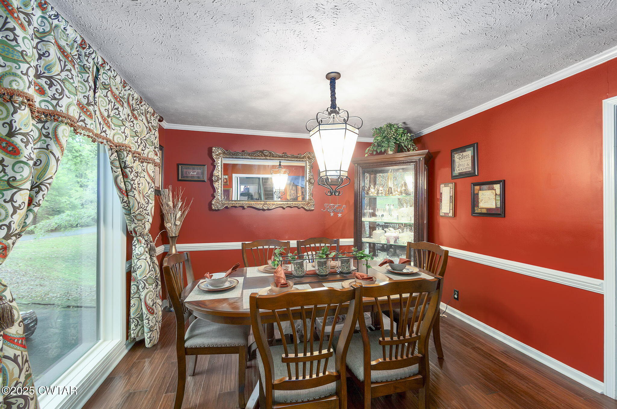 117 Tuckahoe Road Jackson, TN 38305 - Photo 17 of 57 a view of a dining room with furniture window and wooden floor