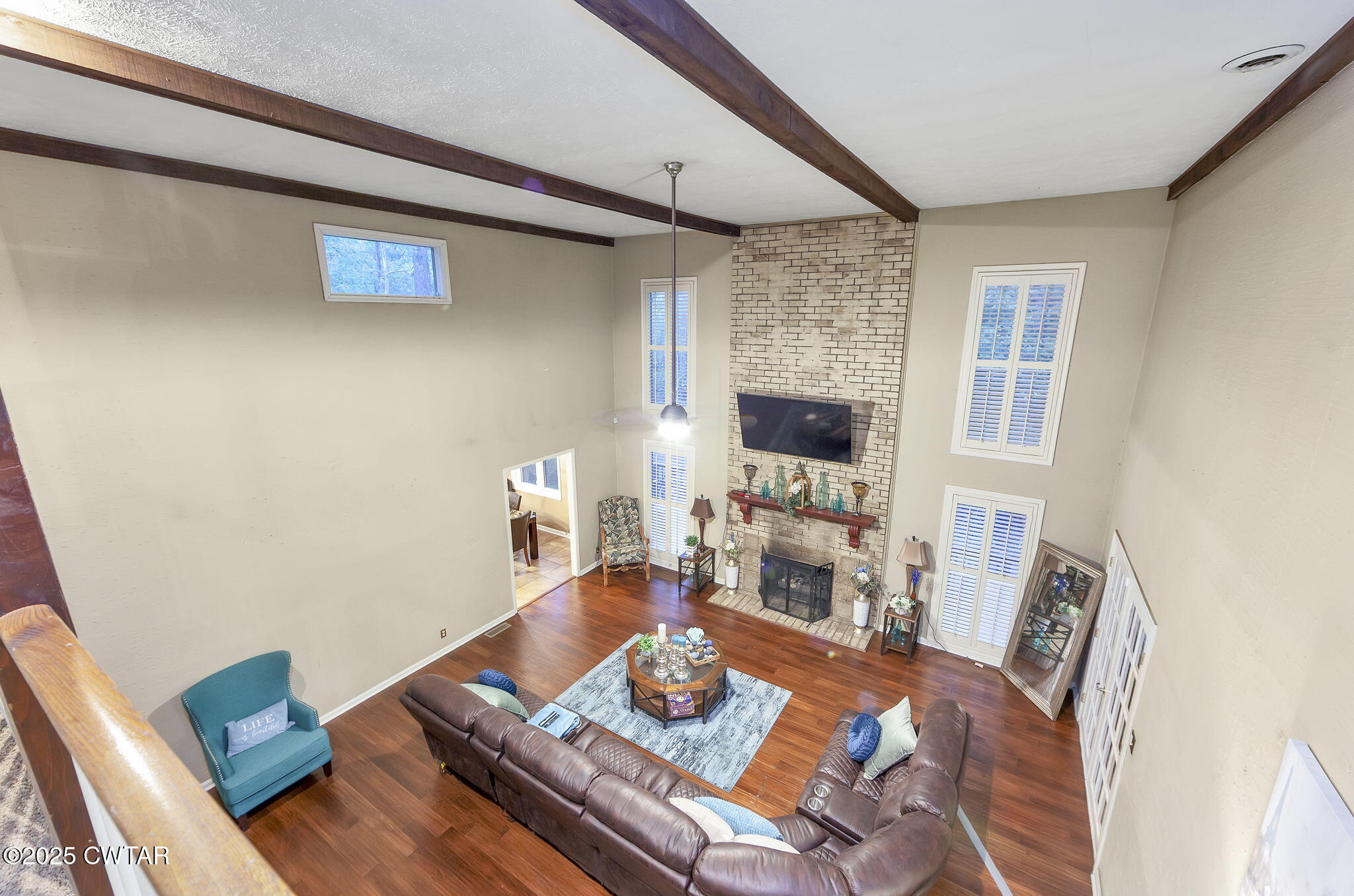 117 Tuckahoe Road Jackson, TN 38305 - Photo 31 of 57 a living room with furniture and a flat screen tv