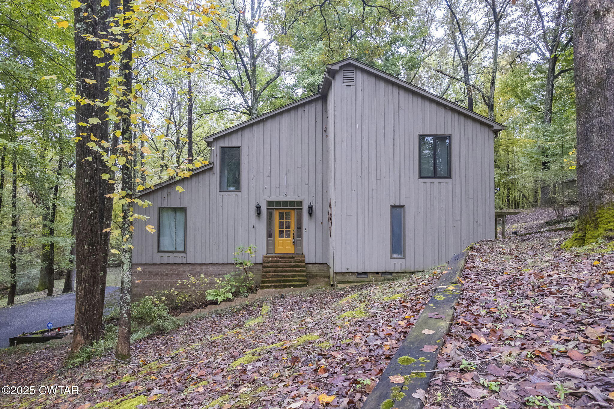 117 Tuckahoe Road Jackson, TN 38305 - Photo 47 of 57 a view of a house with yard and large tree