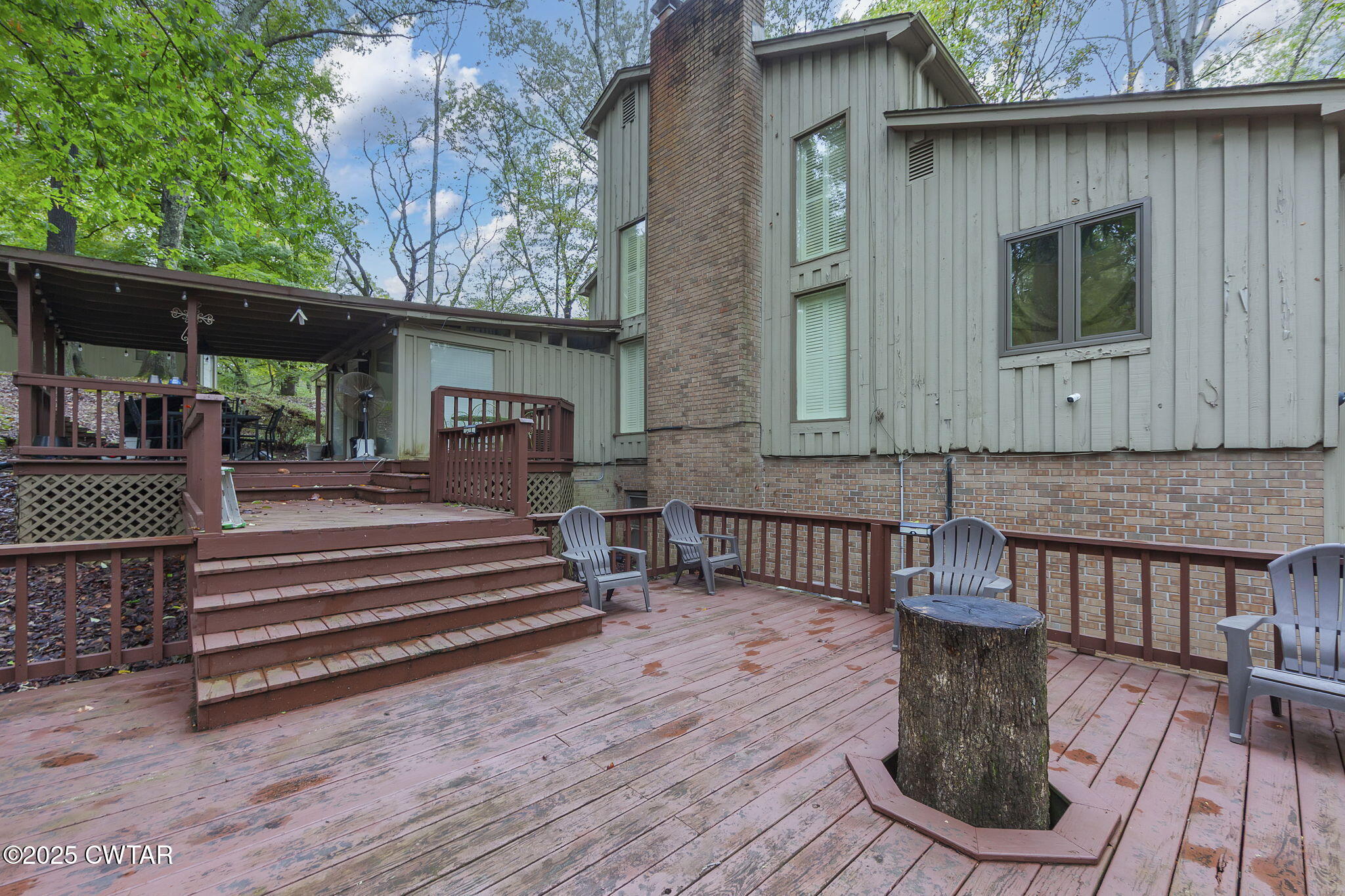 117 Tuckahoe Road Jackson, TN 38305 - Photo 53 of 57 a view of house with wooden deck and furniture